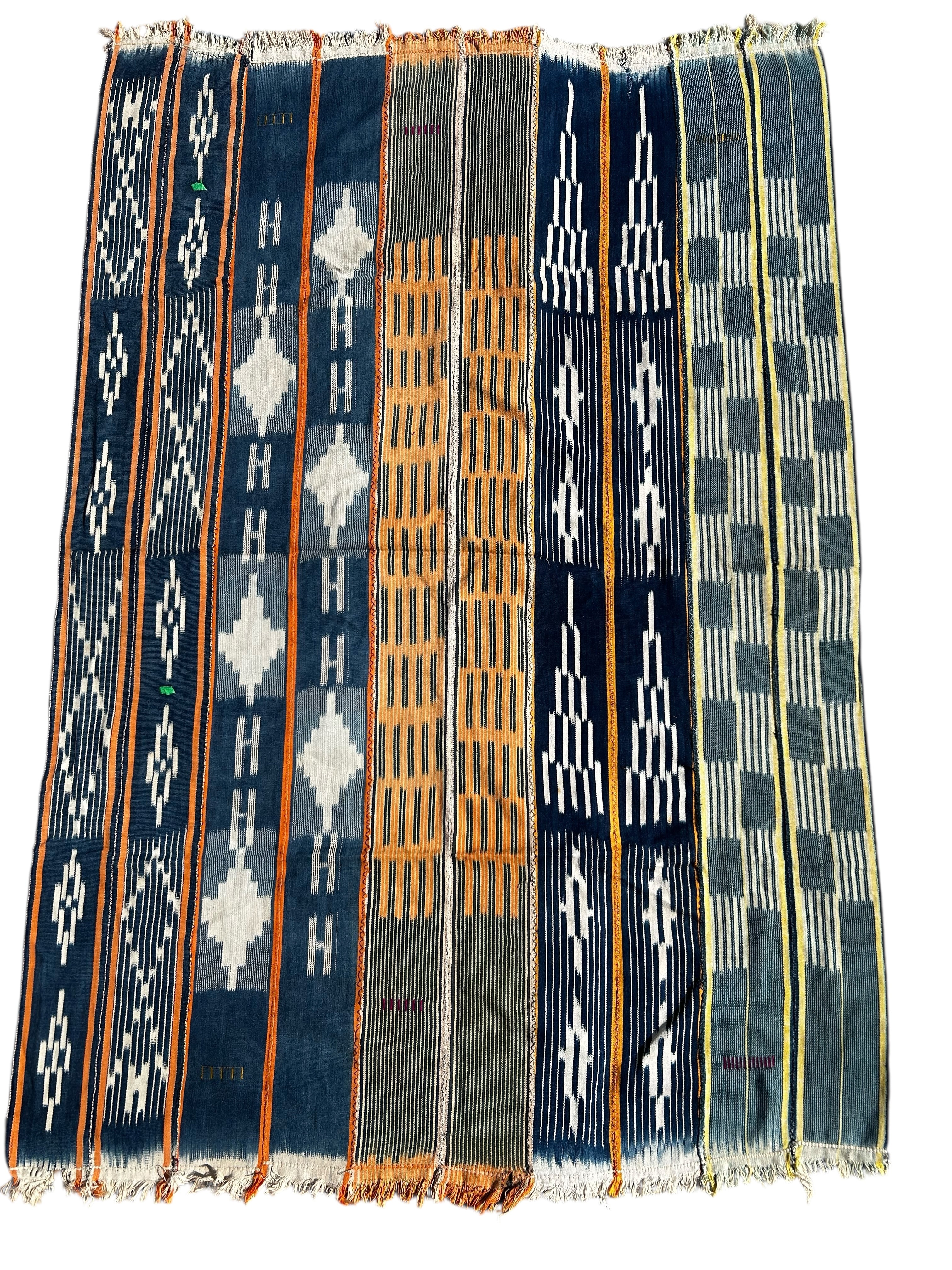 handwoven indigo african textile geometric motif strip weaving detail