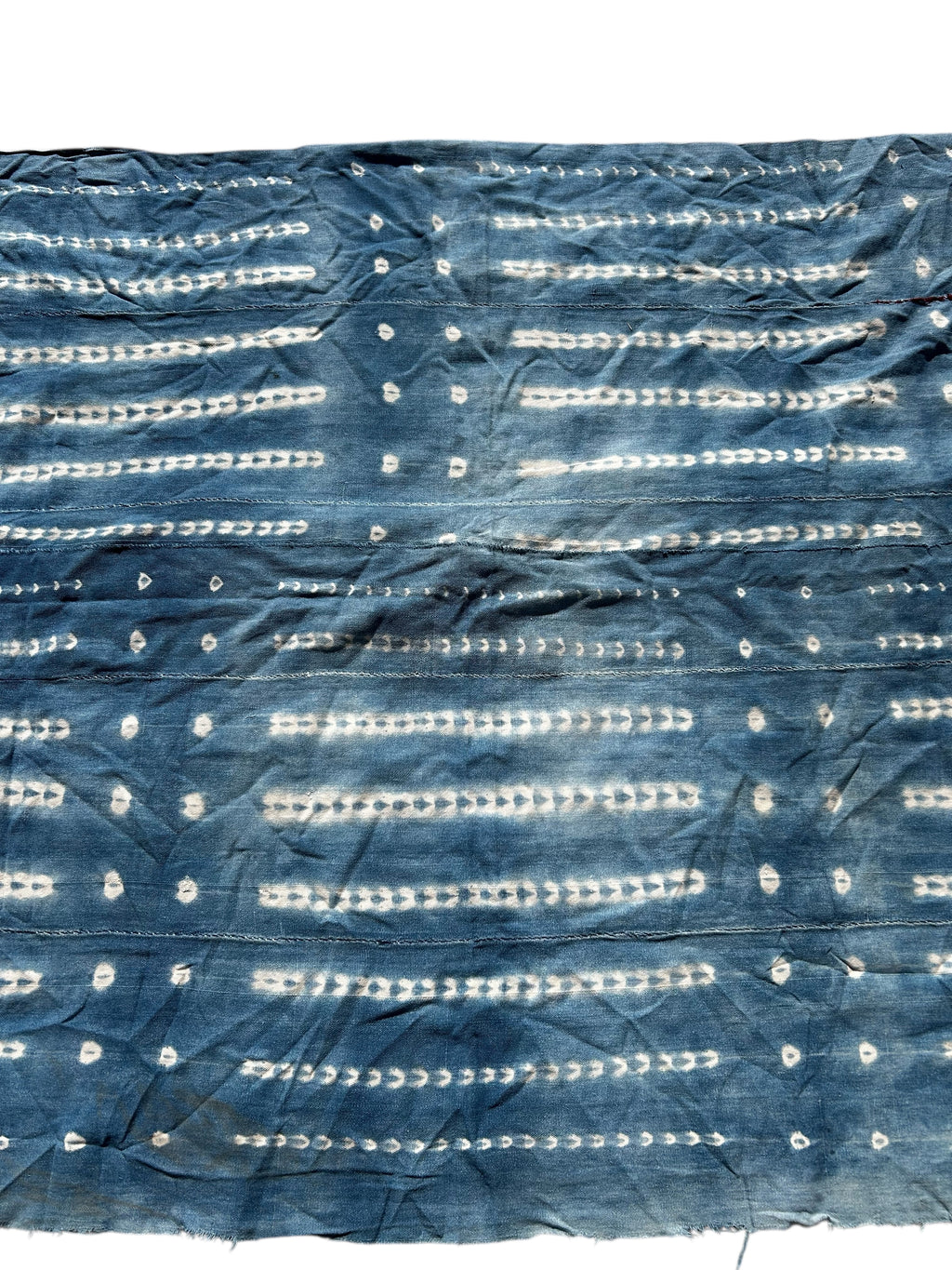 african indigo resist dye pattern hand dyed cotton fabric detail